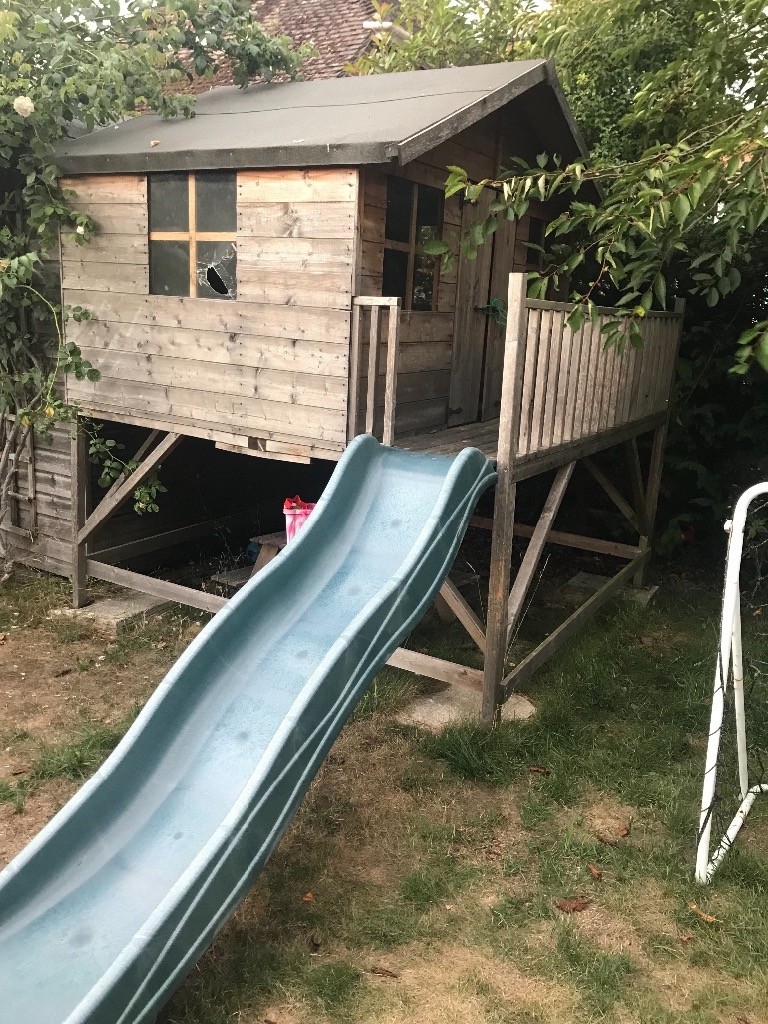 wooden playhouse with slide sale
